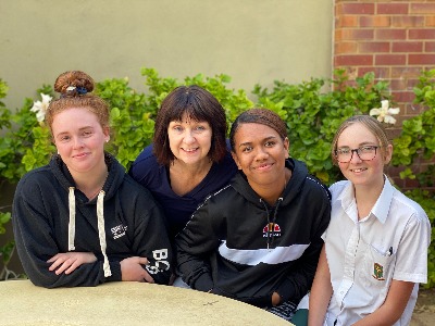 Geraldton Residential College staff member with students